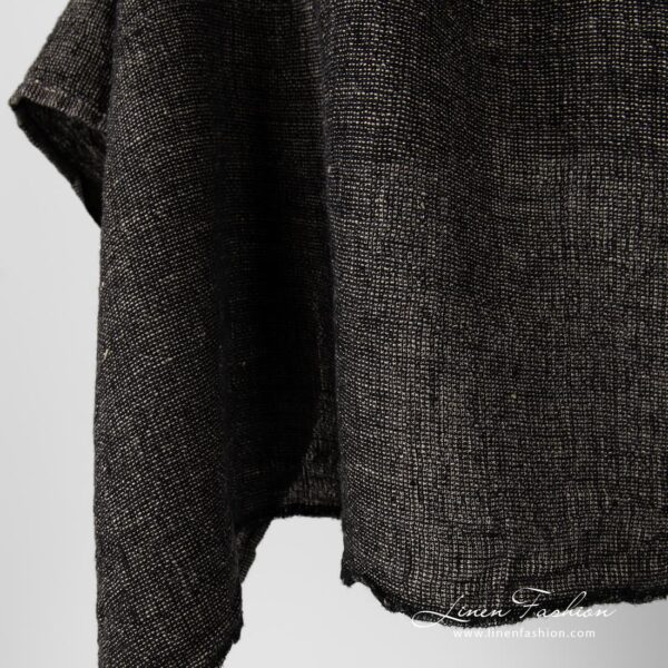 Washed 100% linen fabric in black and flax melange.
