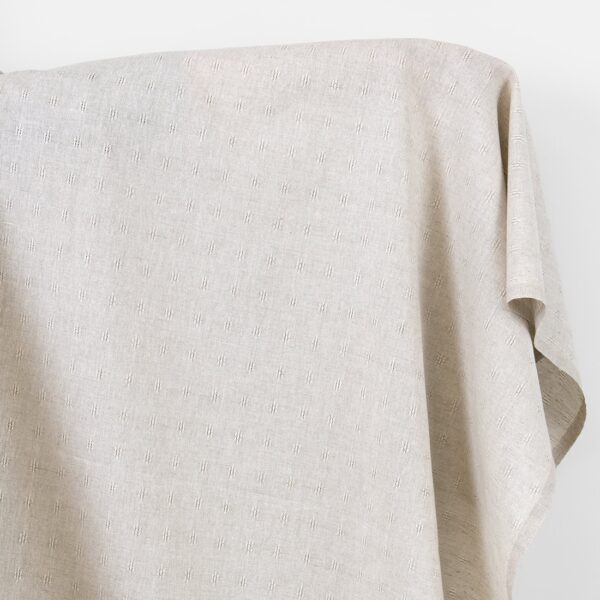 Tissu lin et coton beige avec motif ajouré