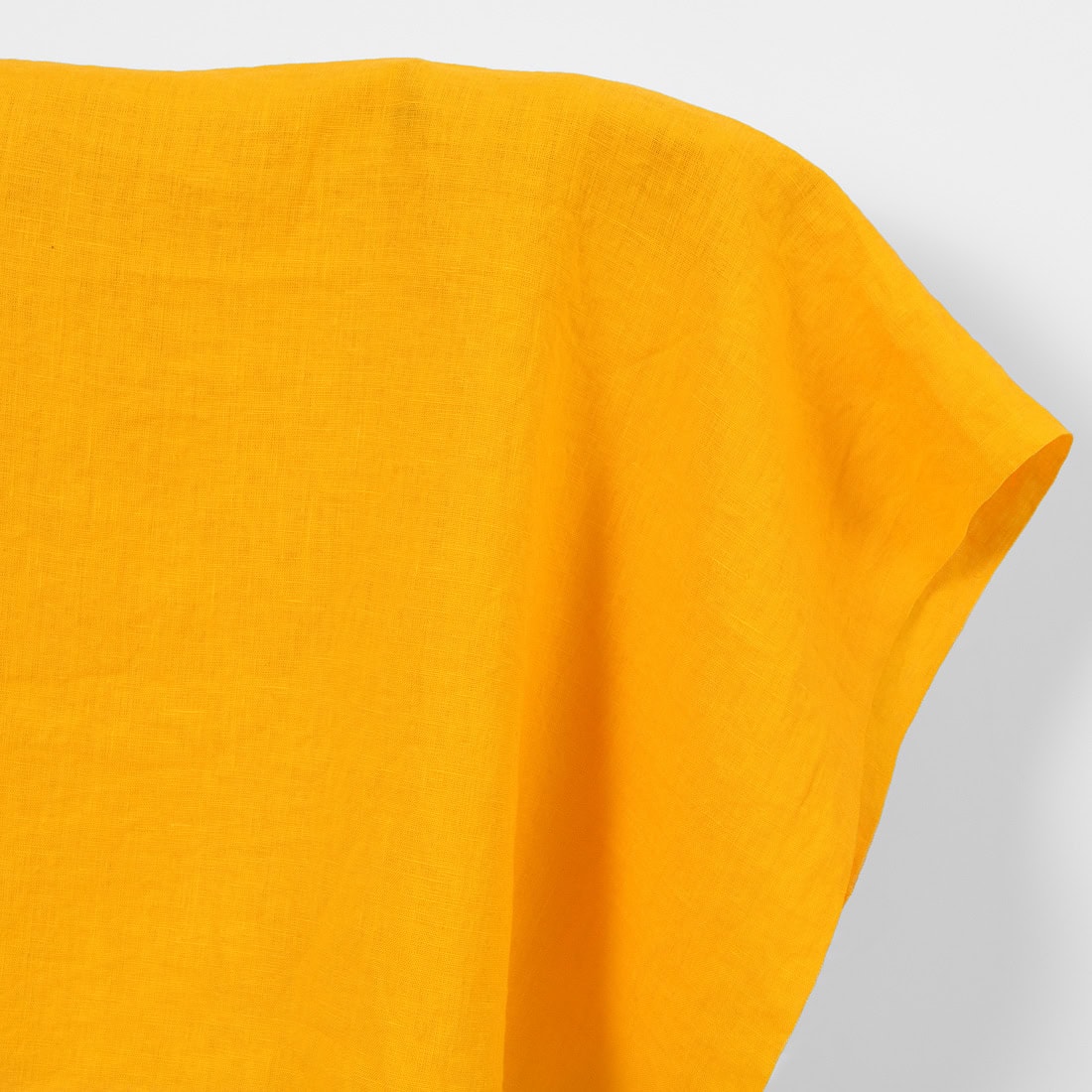 Linen fabric plain warm yellow, washed