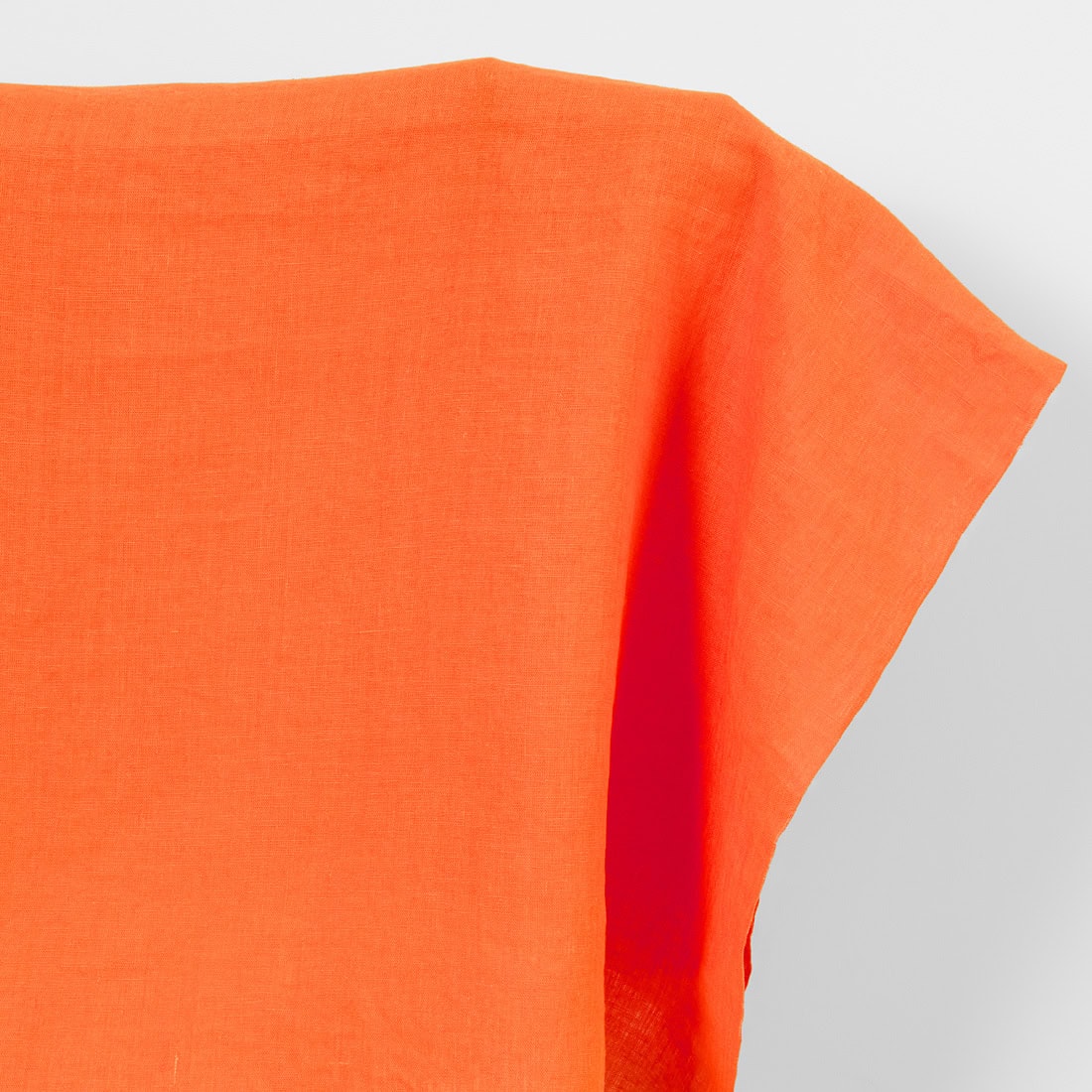Linen fabric plain orange, washed