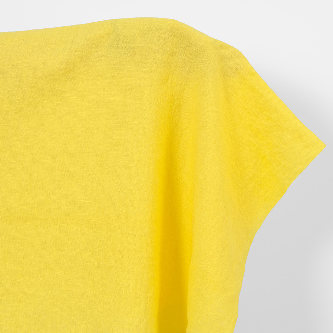 Linen fabric plain bright yellow, washed