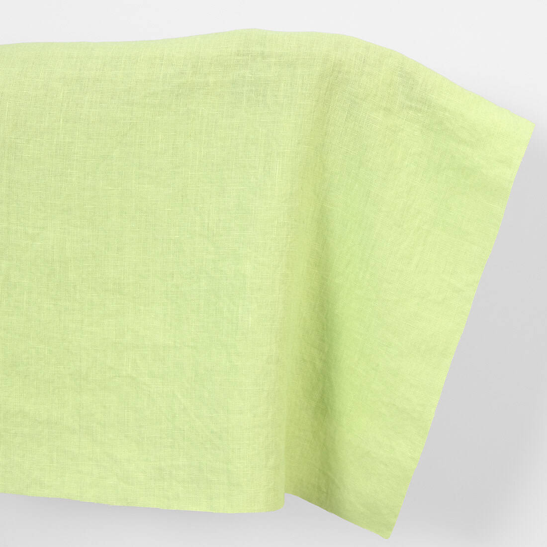 Linen fabric plain pale green, washed