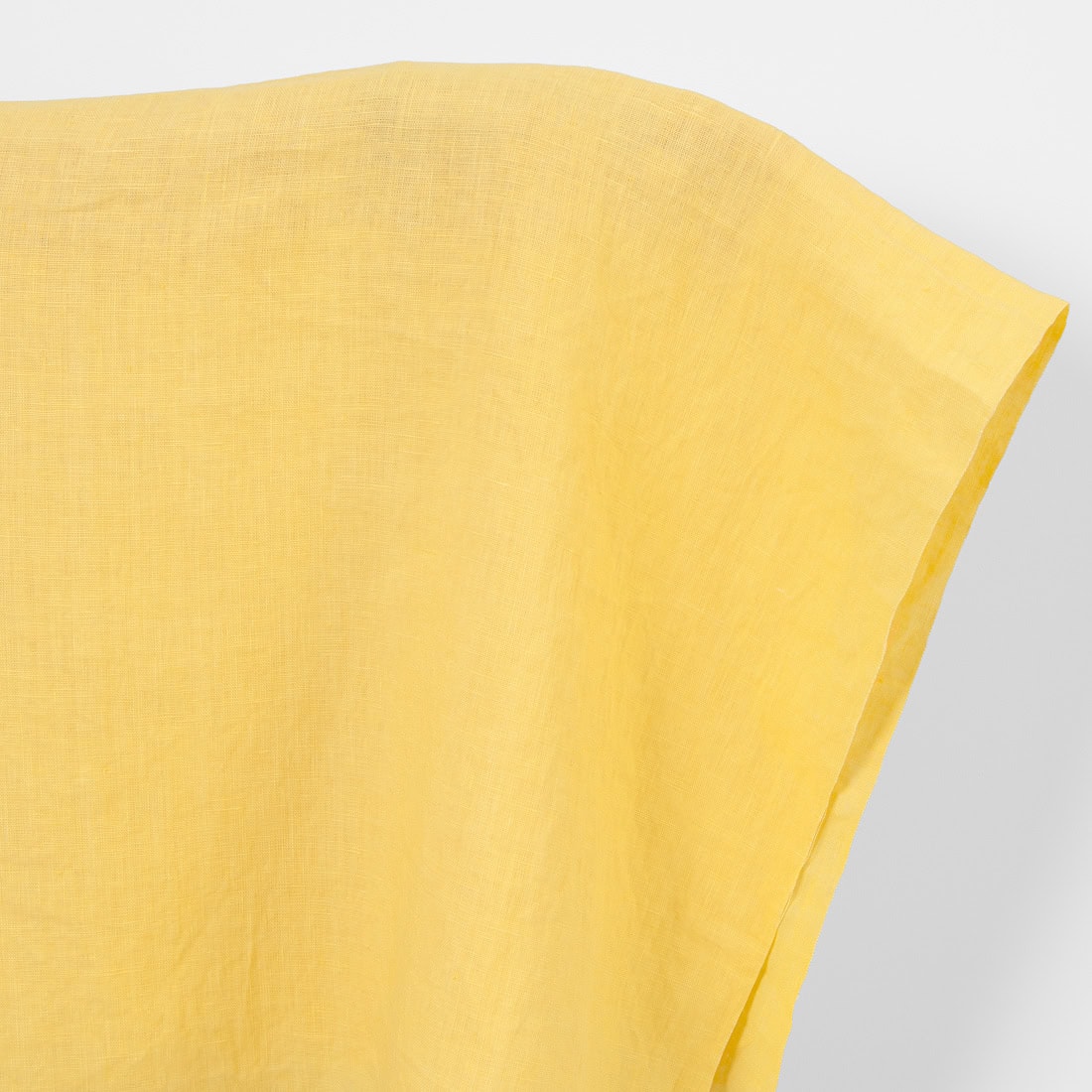 Linen fabric in banana cream colour, washed