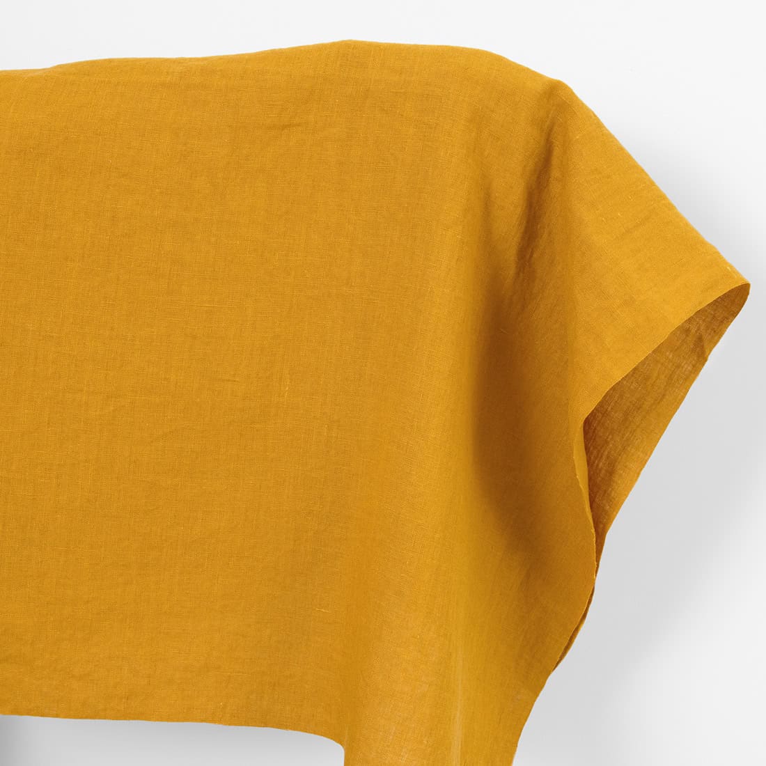 Linen fabric plain ginger yellow, washed
