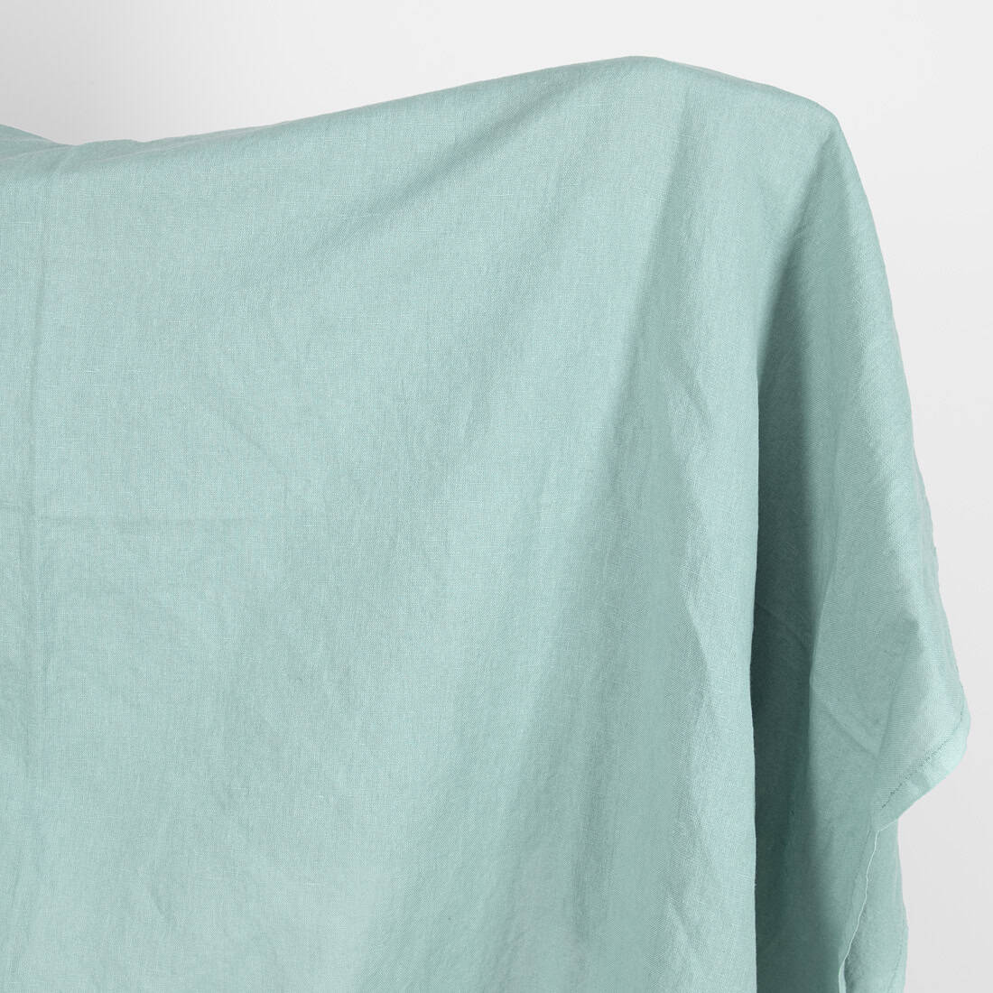 Linen cotton fabric in jadeite colour, washed