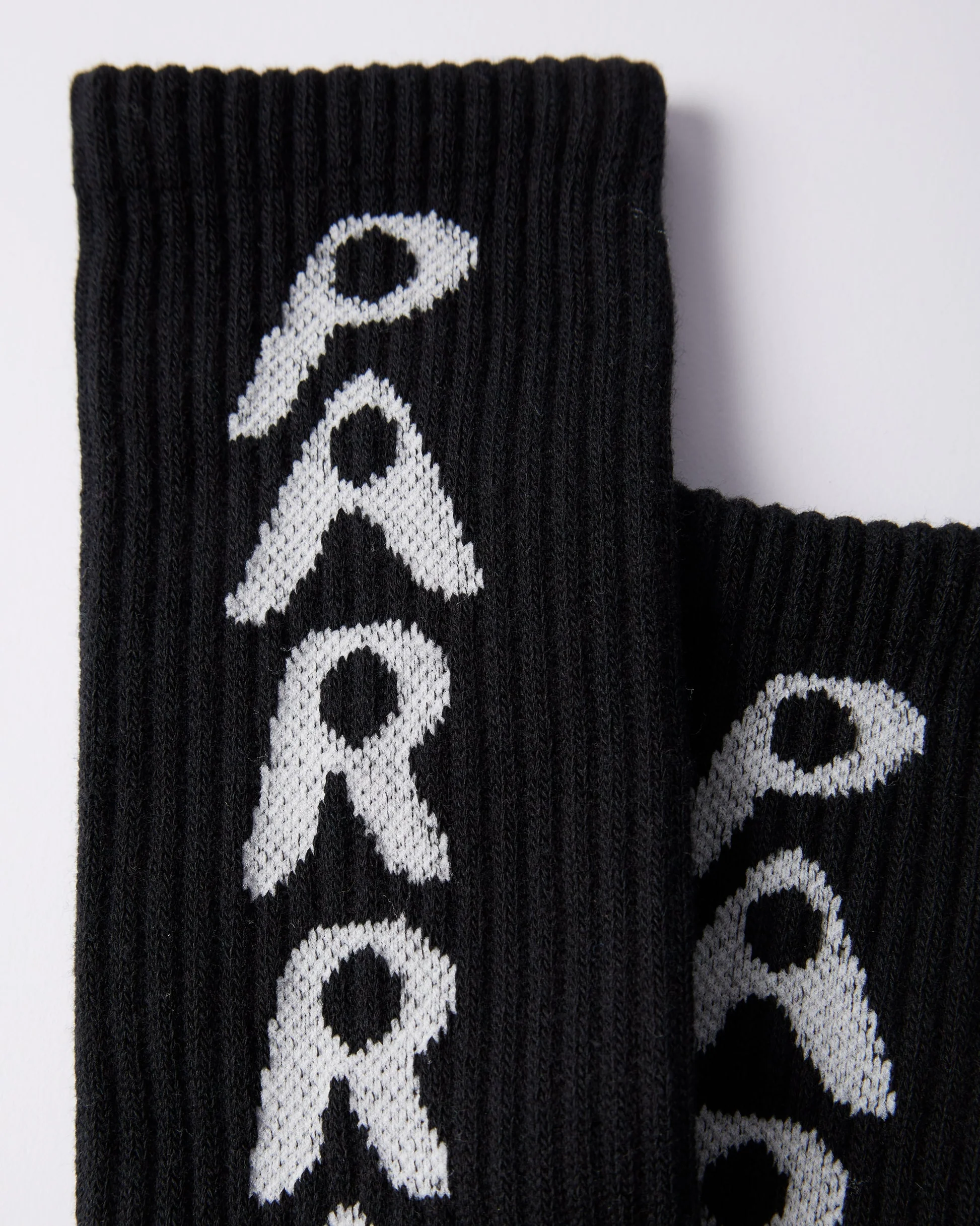 By Parra Hole Logo Crew Socks Black