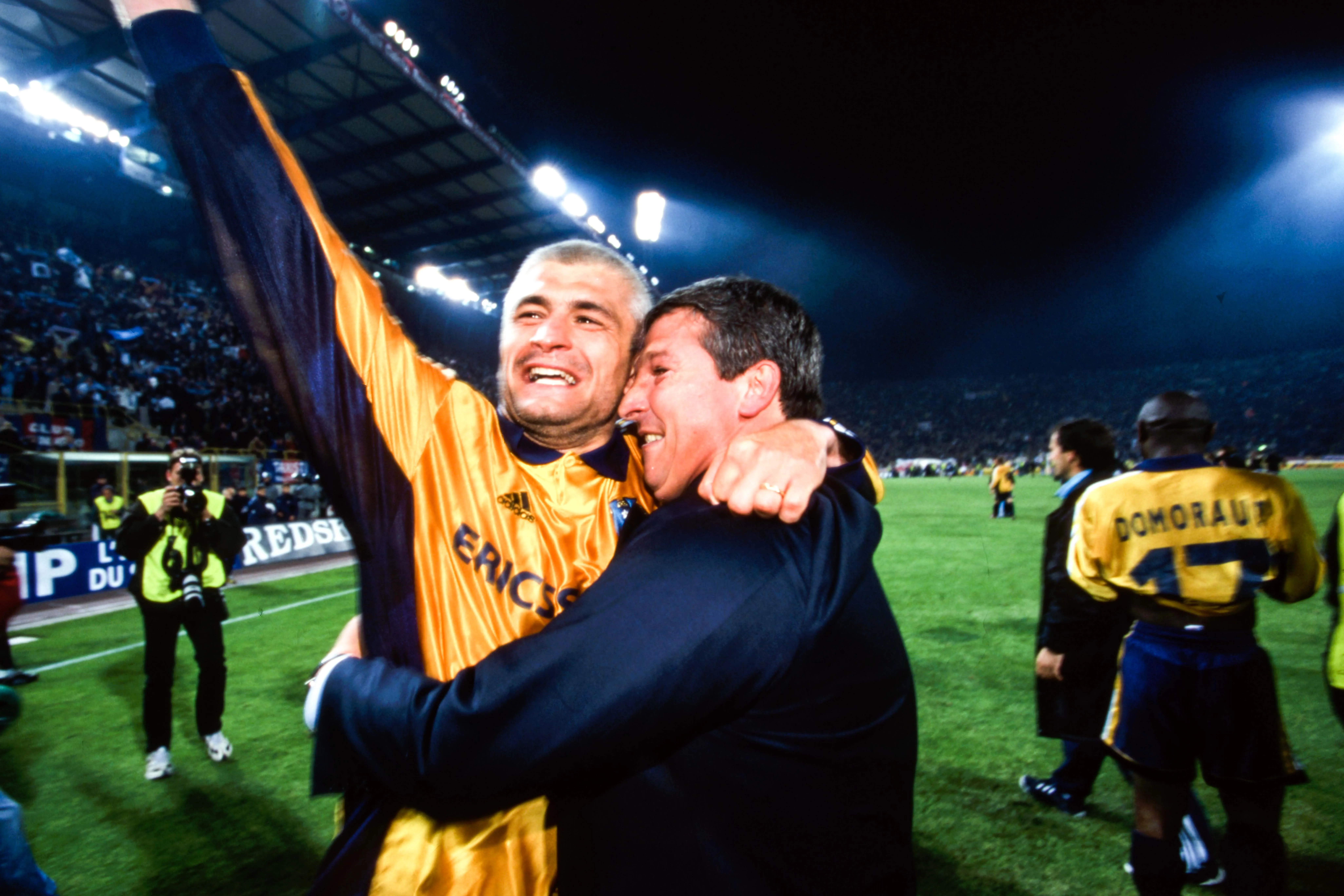 Fabrizio Ravanelli and Rolland Courbis celebrate Marseille's victory in the UEFA Cup quarterfinals