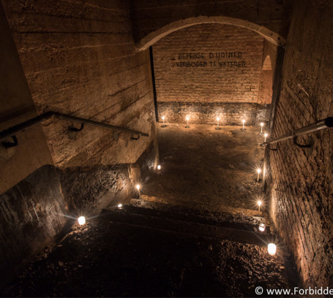 An anti-aircraft shelter beneath the cobblestone