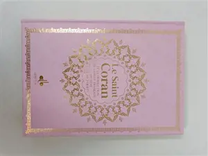 Le saint Coran : et la traduction en langue française du sens de ses versets : couverture rose et tranches arc-en-ciel
