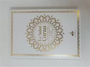 Le saint Coran : et la traduction en langue française du sens de ses versets : couverture blanche avec pages arc-en-ciel