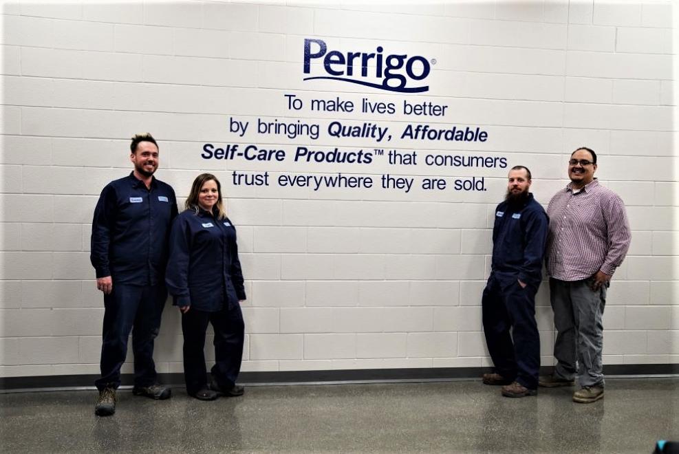 perrigo_sign_with_members.jpg