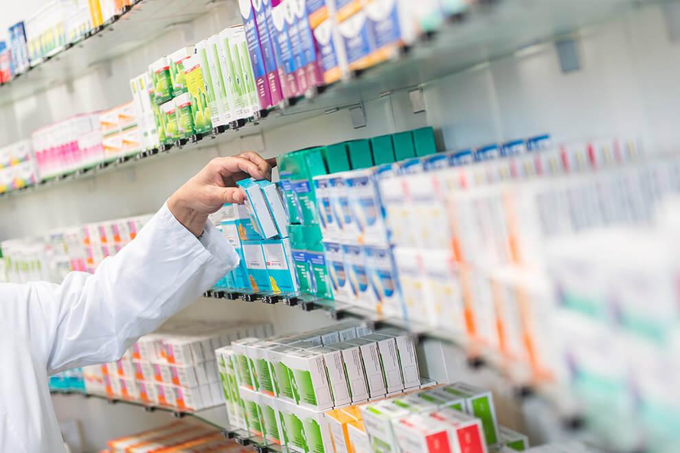 Shelves_hand_taking_medicine.jpg