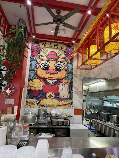 Photo 3 de 龙抄手总店 Ravioli du Sichuan