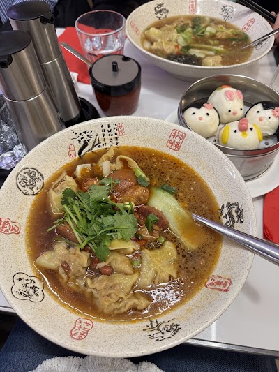 Photo 2 de 龙抄手总店 Ravioli du Sichuan