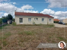 Maison de plain-pied avec 3 garages et fort potentiel d'évol