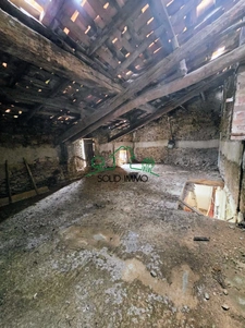 Maison de village à rénover avec box et terrain constructibl