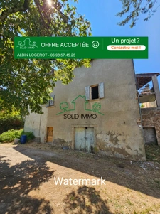 Maison de village à rénover avec box et terrain constructibl