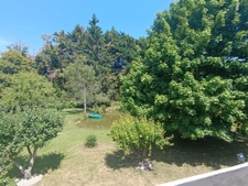 fermette avec studio et étang