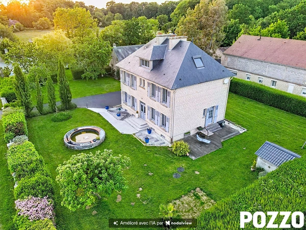 Maison 8 pièces · à Monts-en-Bessin · 450 000 €