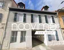 Immeuble loué 183m2 + parking couvert