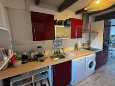 Maison de village avec petit terrain et place de parking