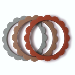 3 bracelets de dentition FLOWER Mushie Cambr.Blue Clementine Nat.
