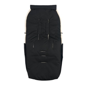 Chancelière en peau de mouton PUFFMUFF Binibamba noir milk