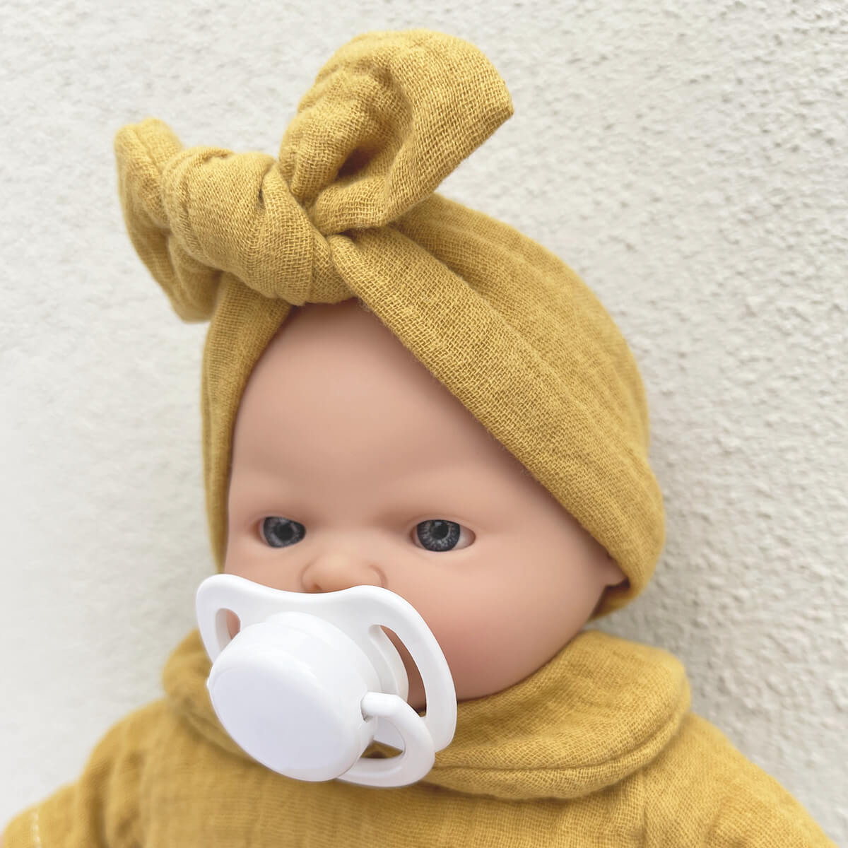 Muñeca 26cm Nina BOBBLE mostaza
