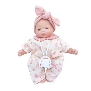 Muñeca Nina 26cm FLOWERS rosa