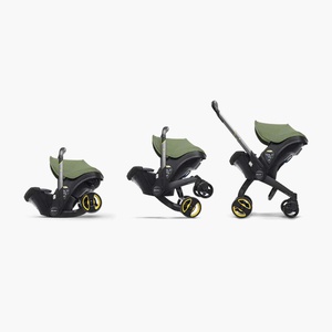 Siège-auto-poussette de bébé à 15 mois Doona i Desert green